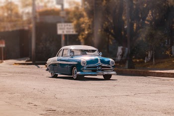 Classic Blue Car on Road
