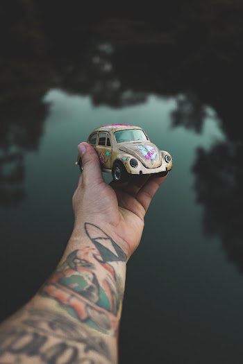 Classic Yellow and Red Volkswagen Beetle Coupe Toy
