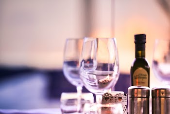 Clear Beverage in Wine Glasses
