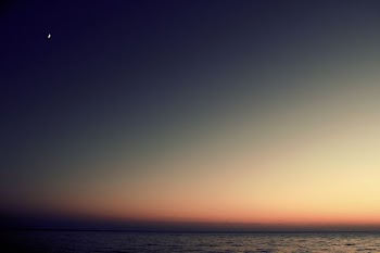 clear body of water during sunset