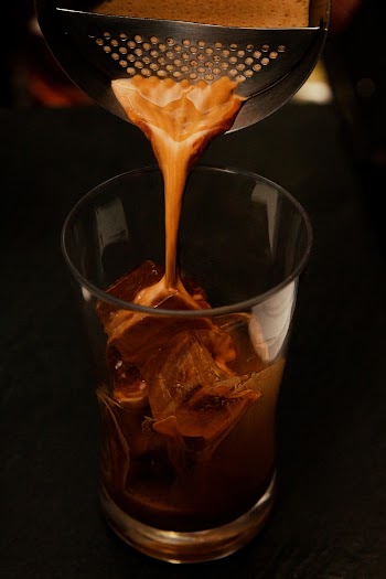 Clear Drinking Glass Filled With Coffee