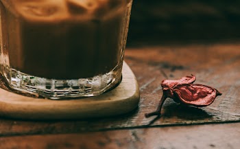 Clear Drinking Glasses on Brown Wooden Coaster