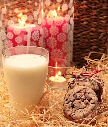 Clear Glass Candle Holder Beside the Brown and Brown Cookie