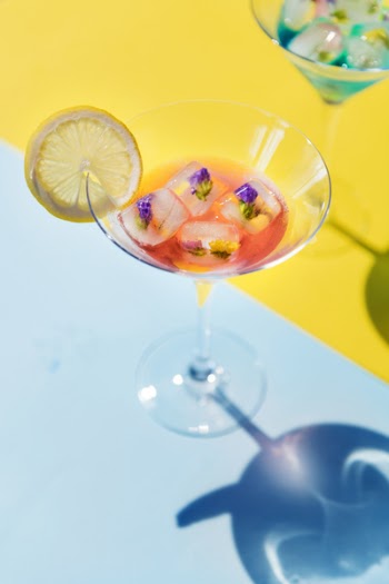 Clear Glass Martini Glass With Ice Cubes