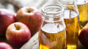 Clear Glass Mason Bottles With Apple Juice