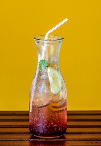 Clear Glass Pitcher Filled With Juice