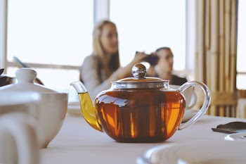 Clear Glass Teapot on White Table
