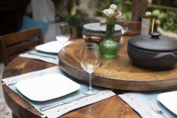 Clear Glass Water Goblet Beside Plate on Table
