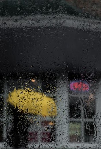 clear glass window with water