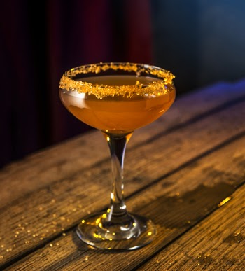 Clear Liquor Glass With Orange Liquid