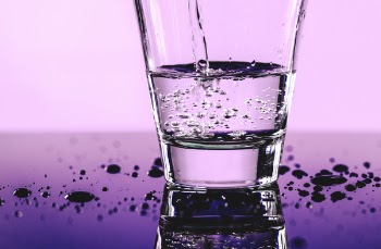 Clear Rock Glass With Clear Liquid in It
