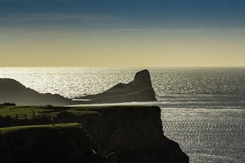 Cliff Near Sea Under Clear Sky