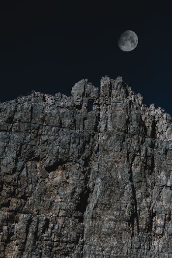 cliff over moon