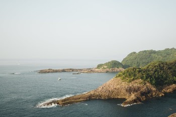 Cliffside View Of The Water Below