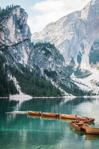 clinker boat on body of water