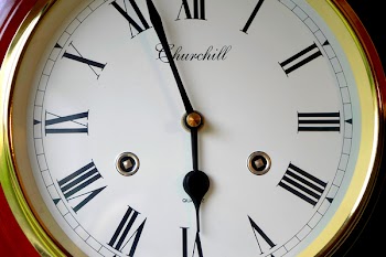 Clock Displaying 5:57 Time