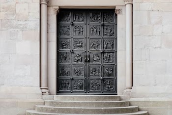 close black metal door