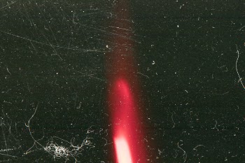 Close-up abstract red flame on scratched surface Free Photo
