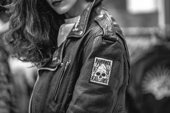 Close-up Grayscale Photo of Woman Wearing Leather Jacket