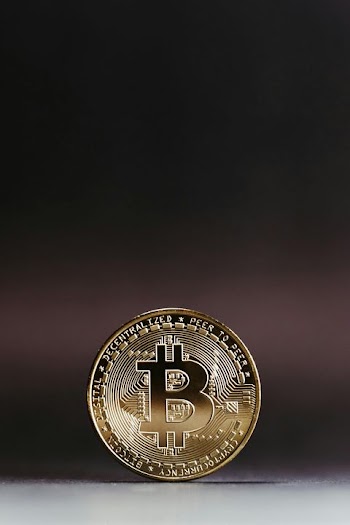 Close-up of a Bitcoin Coin on Dark Background
