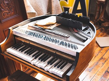 Close-up Of A Brown Antique Piano