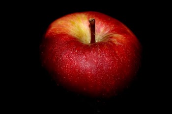 Close-up of Apple Against Black Background