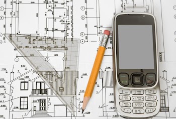  Close up of architect with blueprints