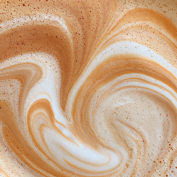 Close-Up of Artistic Latte Foam Swirls