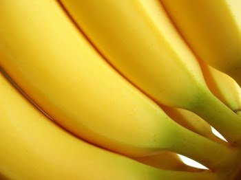 Close-up of at bunch of yellow bananas to be used as a background