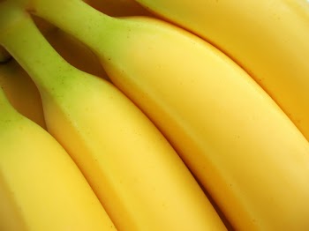 Close-up of at bunch of yellow bananas to be used as a background
