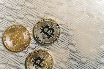 Close-up of Bitcoin Coins on Textured Background