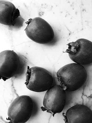 Close-up Of Black Berries On White Marble Top 