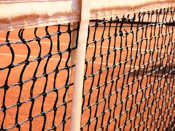 Close-up of Chainlink Fence Against Sky