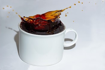 Close-up of Drink Served on White Surface