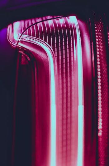 Close-up of glowing lines in a pink neon