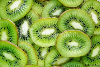 Close up of green kiwi fruit slices