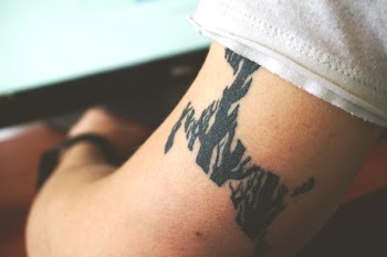 Close-up of Hand With Tattoo