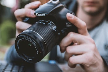 Close-up of Man Holding Camera