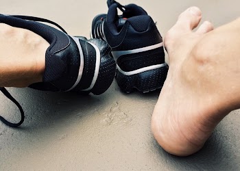 Close-up of Man Wearing Shoes