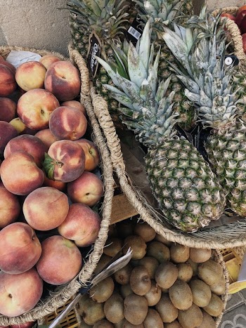 Close-up of Pineapples, Peaches and Kiwis