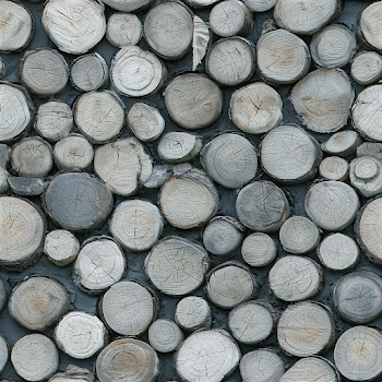 Close-Up of Stacked Wooden Logs