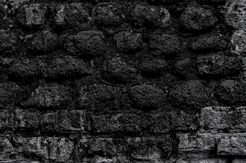Close-Up of Weathered Rough Stone Wall