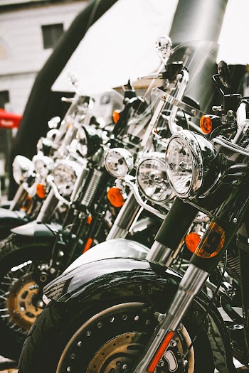 Close-up photo of a Black and Silver Cruiser Motorcycle's Headlights