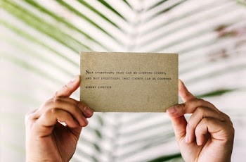 Close-Up Photo of a Brown Card