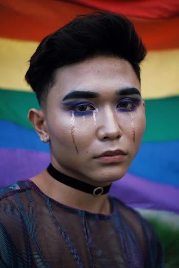 Close-Up Photo of a Man Wearing Make-Up