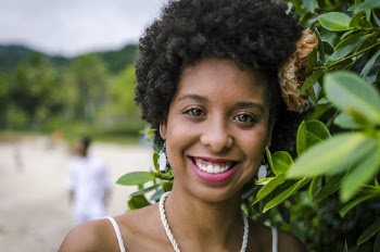 Close-Up Photo of a Smiling Woman