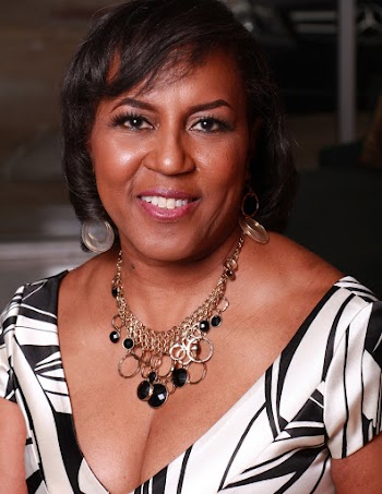 Close-Up Photo of a Woman Wearing White and Black V-neck Top