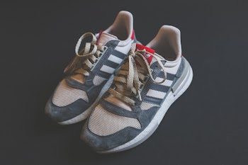 Close-Up Photo of Adidas Shoes