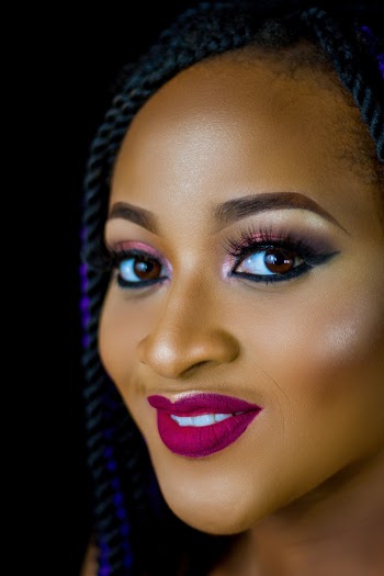Close-up Photo of Beautiful Smiling Woman in Make-up 