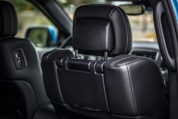 Close Up Photo of Black Leather Car Seat